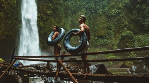 2 guys outdoors on a bridge