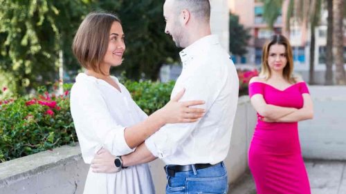jealous woman seeing a couple