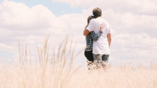 couple in a grassland