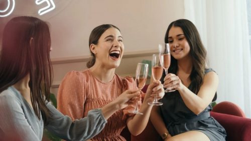 girls with drinks enjoying a party